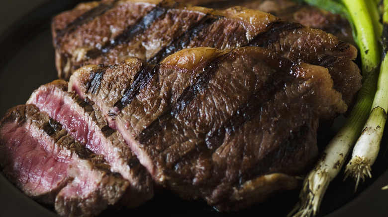 Sliced steak and scallions