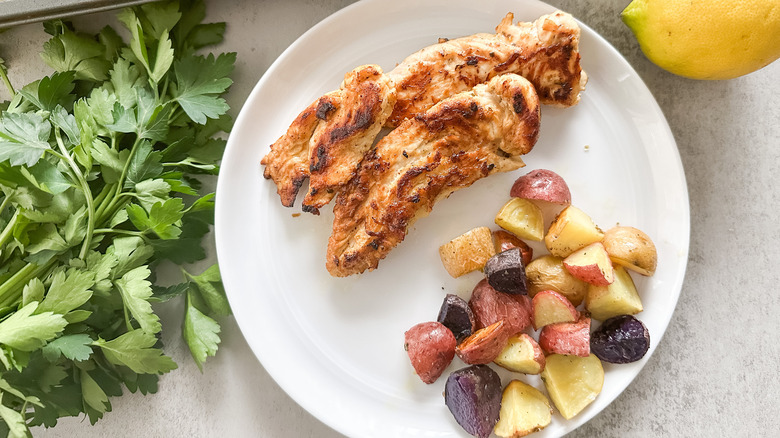 plated chicken and roasted potatoes