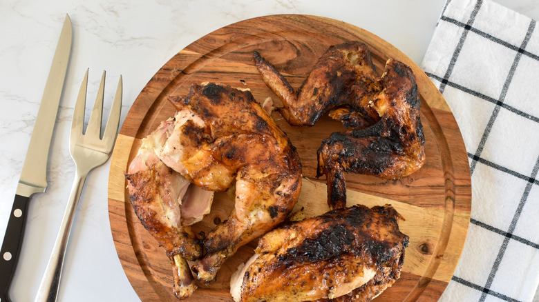 beer can chicken pieces on plate 