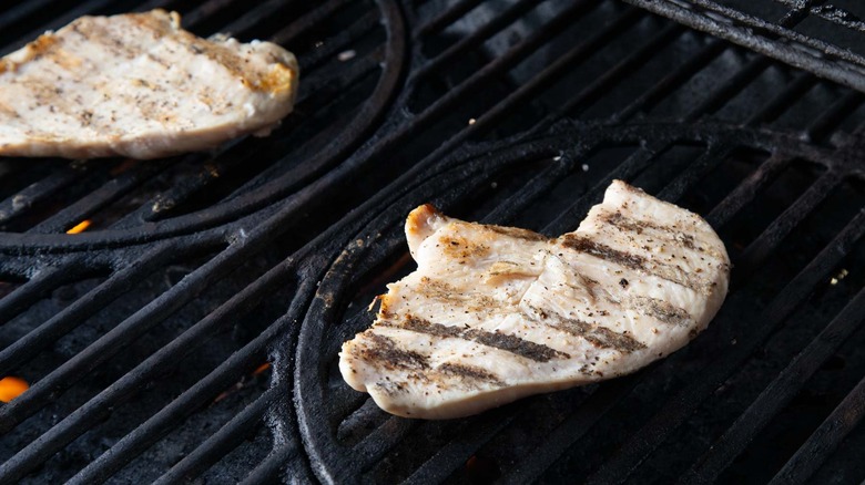 Cooked chicken on grill