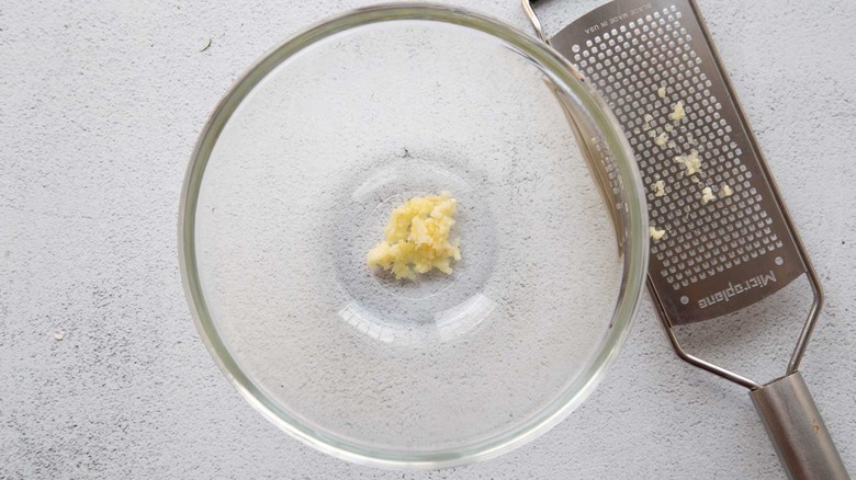Grated garlic in a clear bowl