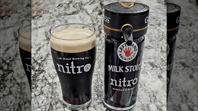 Glass and can of Left Hand Brewing Milk Stout Nitro on a stone countertop