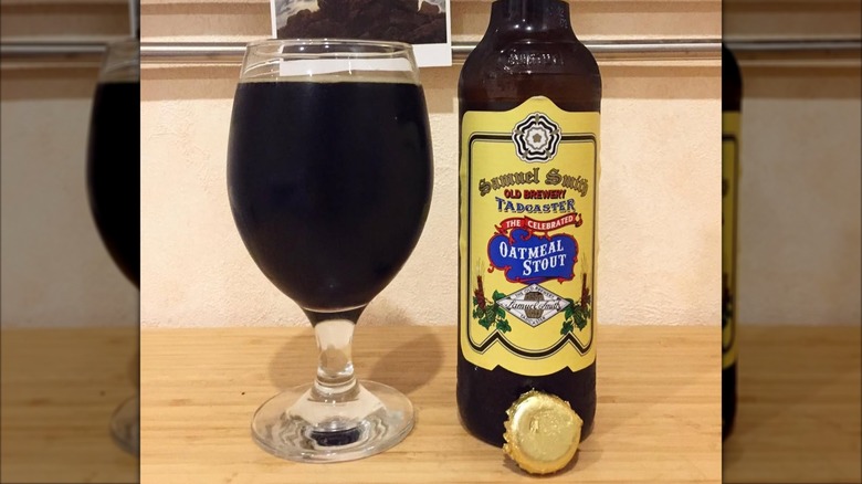 Glass and bottle of Samuel Smith Oatmeal Stout