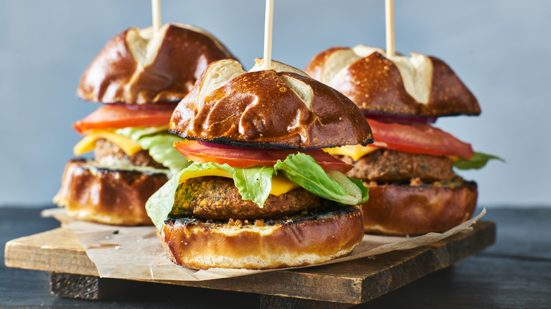 Vegan sliders on pretzel buns