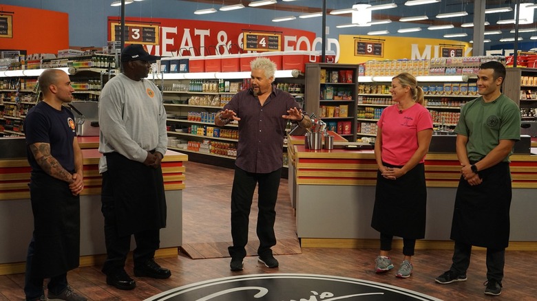 Guy Fieri talking to contestants
