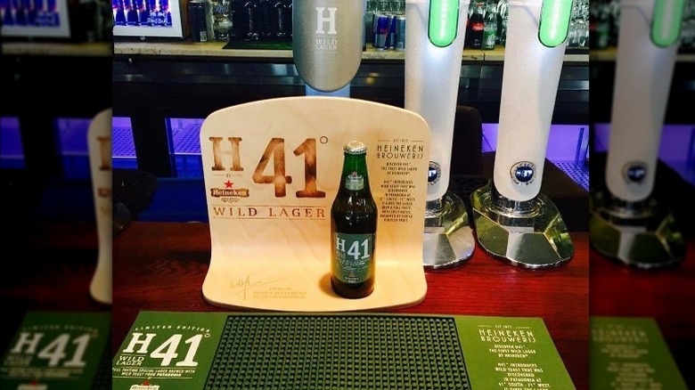 Heineken H41 bottle and tap at bar