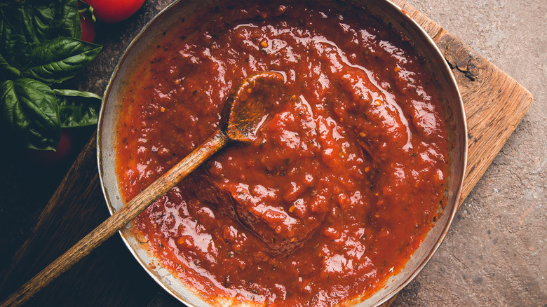 pasta sauce sitting in pan 