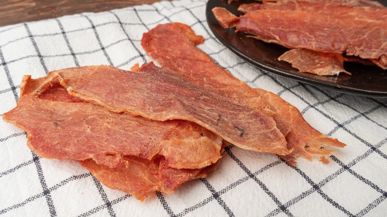 strips of jerky on towel