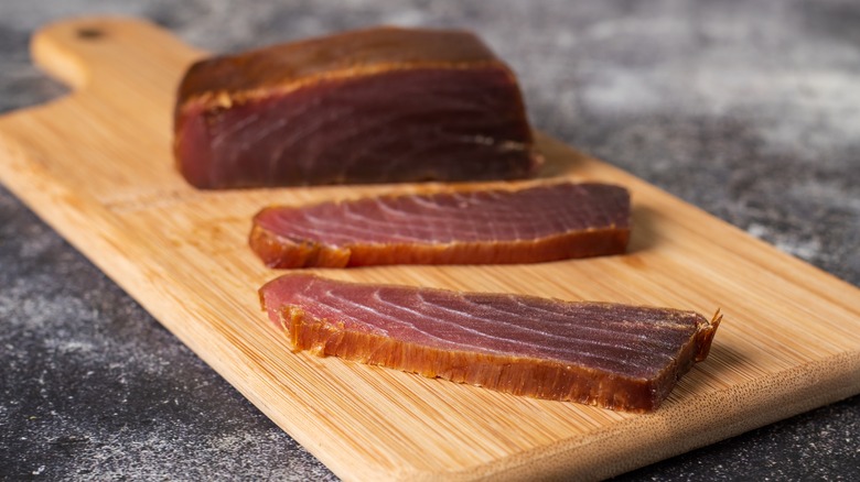tuna jerky on cutting board
