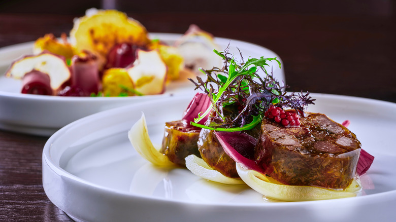 Fancy food on white plates