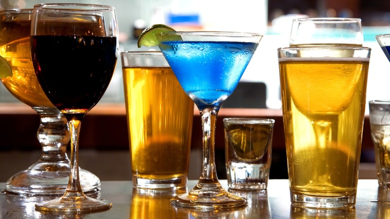 Assorted glasses of wine, beer, cocktails, and other alcohol