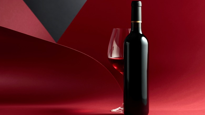 Bottle and glass of red wine