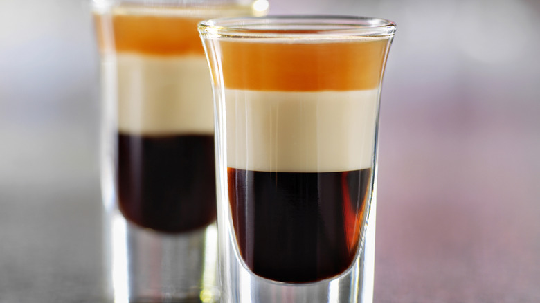 Shot glasses containing layered shots