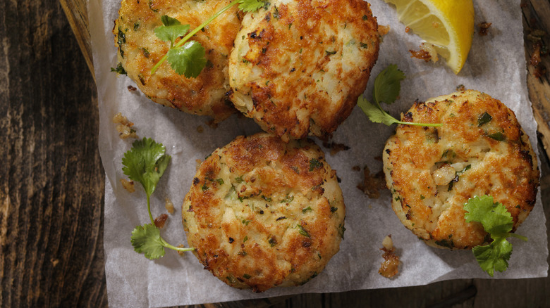 Crab cakes on parchment paper