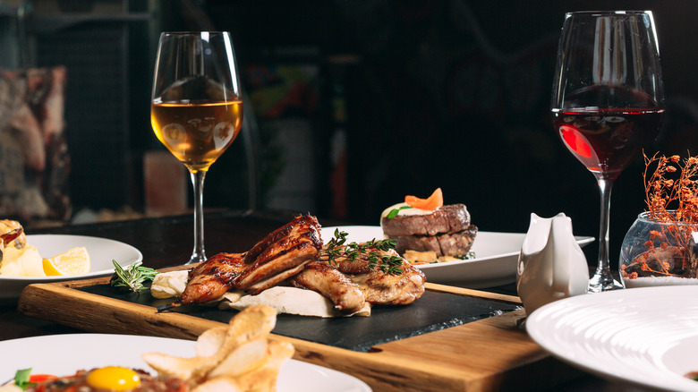 Different meals and beverages on a restaurant table