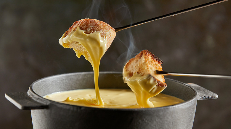 bread pieces covered in fondue 