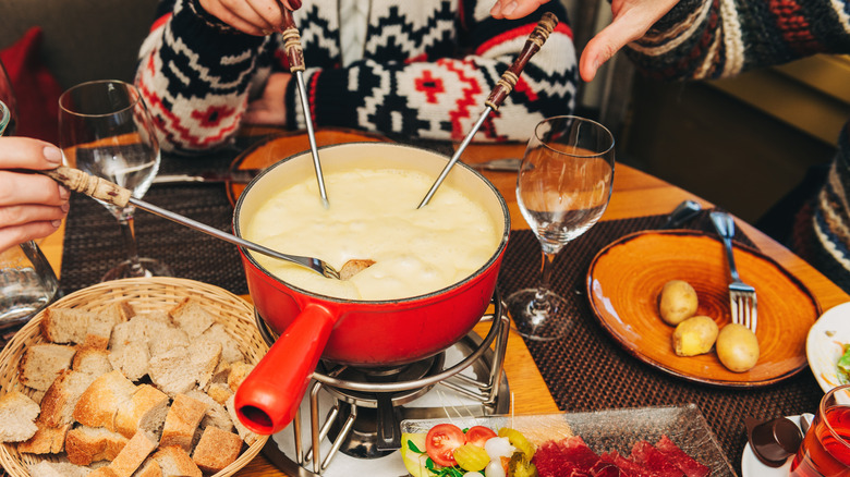 fondue spread on dining table 