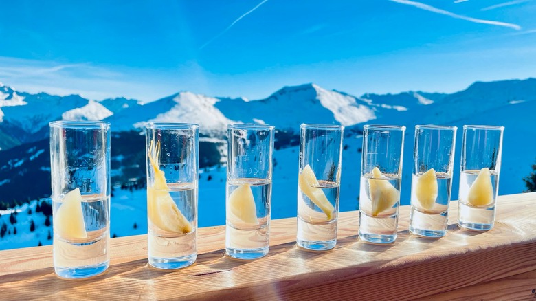 schnapps shots with mountain landscape