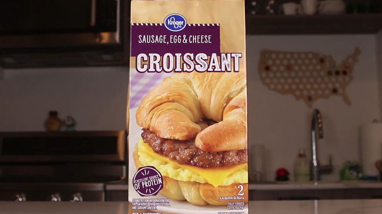 A box of two Kroger brand sausage egg and cheese croissant breakfast sandwiches from the freezer aisle