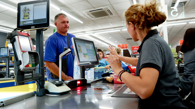 Lidl cashier waiting on customer