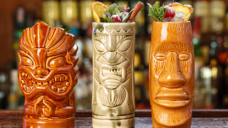 tiki cocktails with fruit garnish