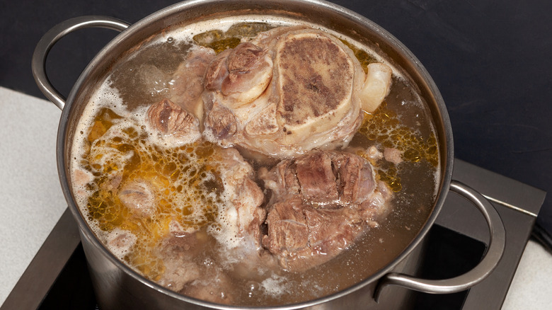 bones boiling in a stockpot 