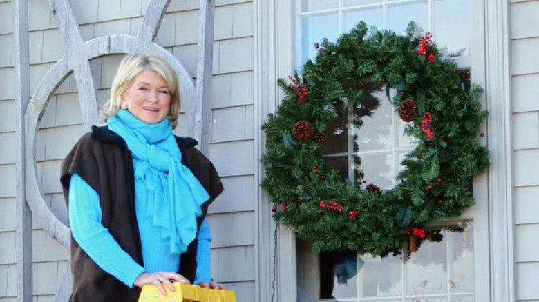 Martha Stewart with Christmas wreath