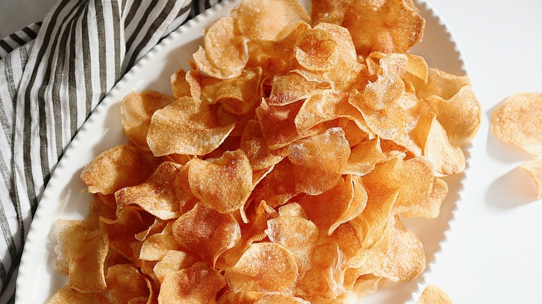 homemade potato chips on plate 