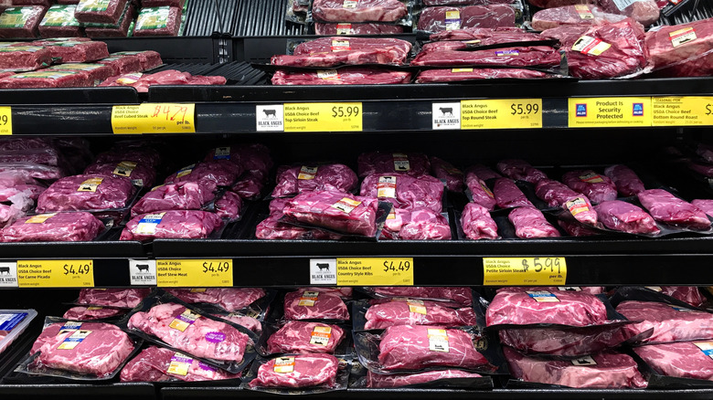 Meat section at Aldi store with prices