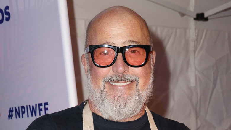 Andrew Zimmern smiling