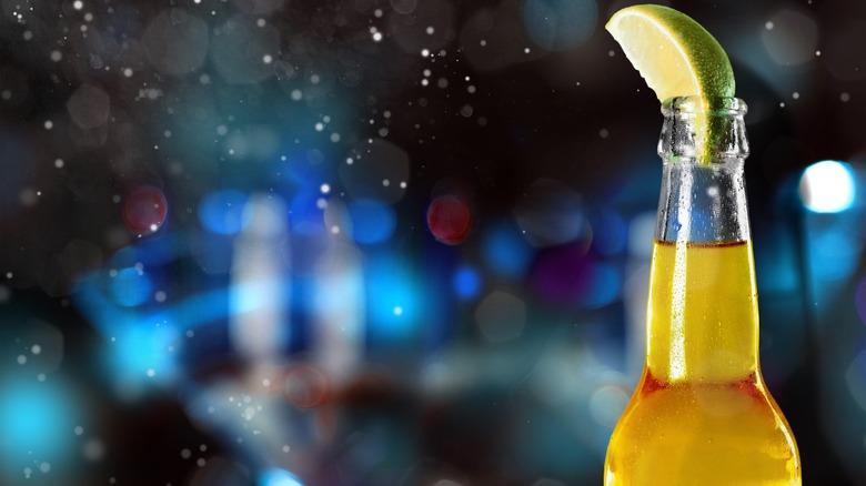 beer bottle with lime wedge