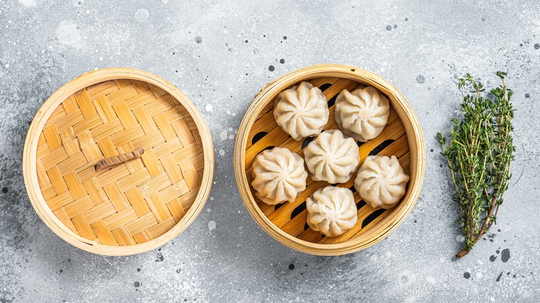 Bamboo steamer with dumplings