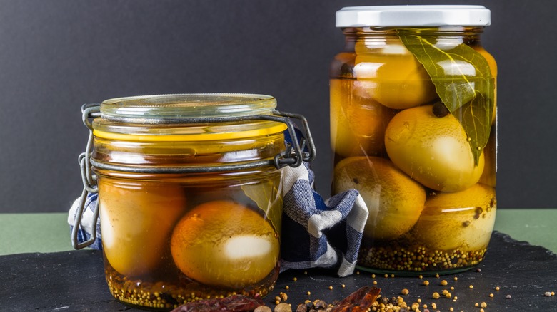 Two jars of pickled eggs