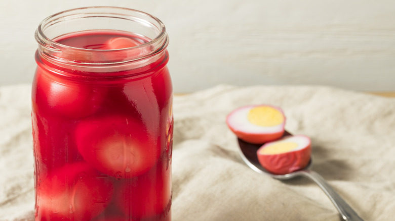 Jar pink pickled eggs