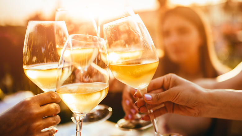 toasting wine glasses