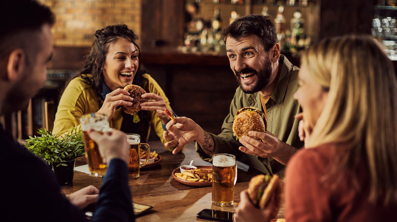 Friends eating out together