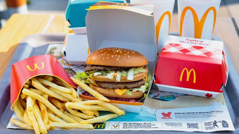 McDonald's meal with fries, burger, and nuggets on a tray