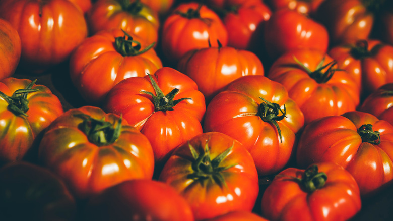 piles of ripe tomatoes