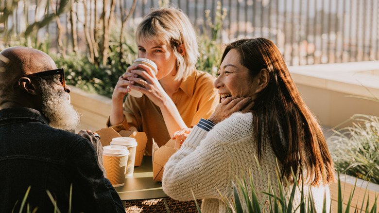 people outside with coffee