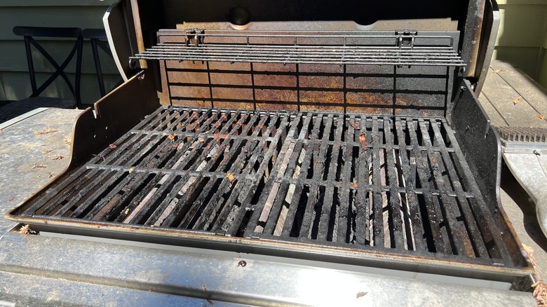 Open grill with metal plates.