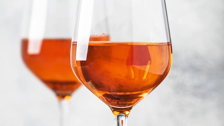 two glasses of orange wine