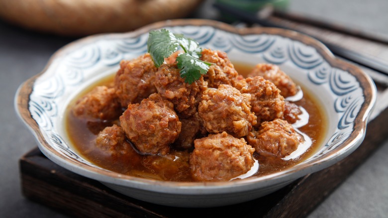 Meatballs in a bowl of sauce