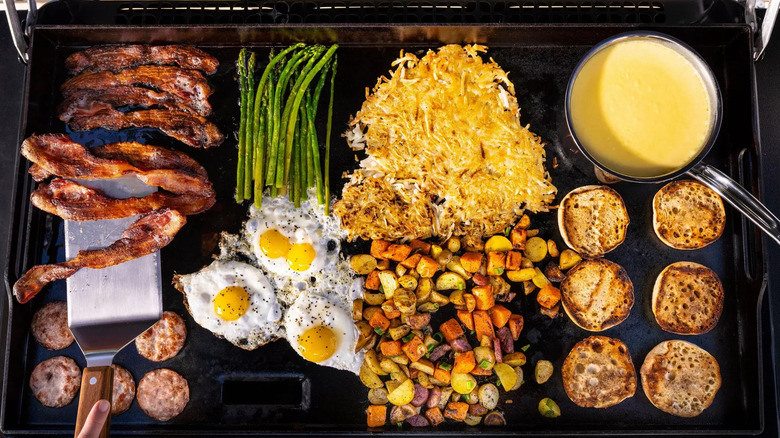 Food cooking on a flat top grill