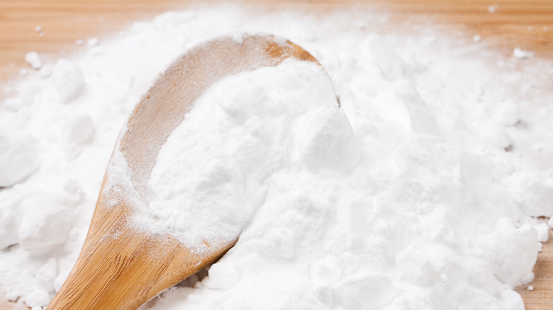 wooden spoon and baking soda