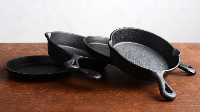 Cast iron pans on table