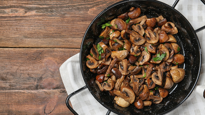 sauteed mushrooms in frying pan