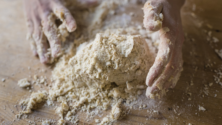 Dough on fingers