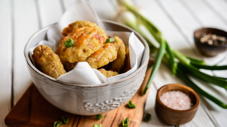 Cheddar scallion biscuits in bowl