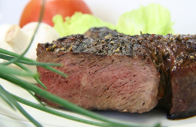 To cook a medium-well steak