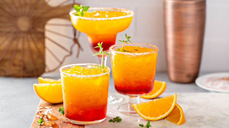 Two-tone Margarita cocktails in different glasses